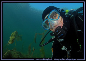 Self-Portrait with my good old friend Mister Pike Fish...... by Michel Lonfat 